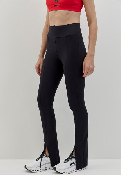 Calça legging flare com fenda e bolso lisa preto Voá