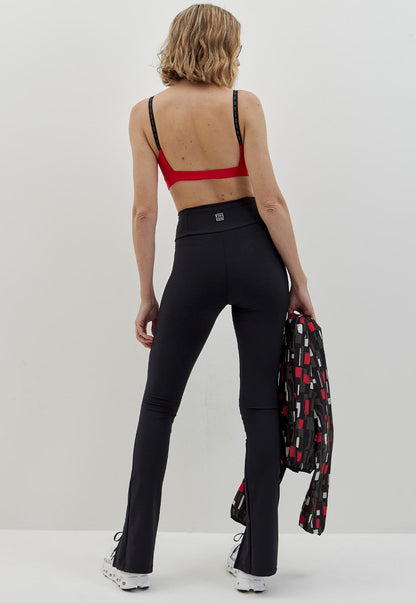 Calça legging flare com fenda e bolso lisa preto Voá