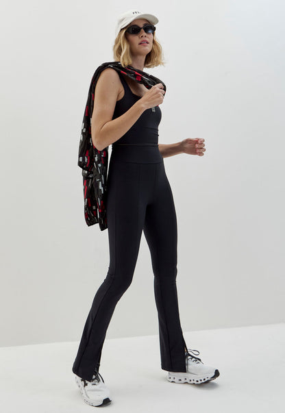 Calça legging flare com fenda e bolso lisa preto Voá