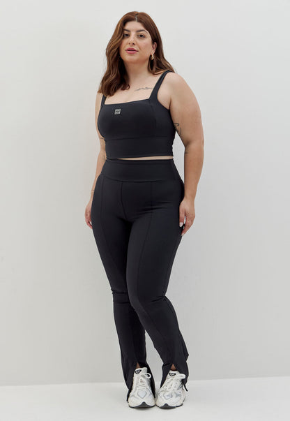 Calça legging flare com fenda e bolso lisa preto Voá